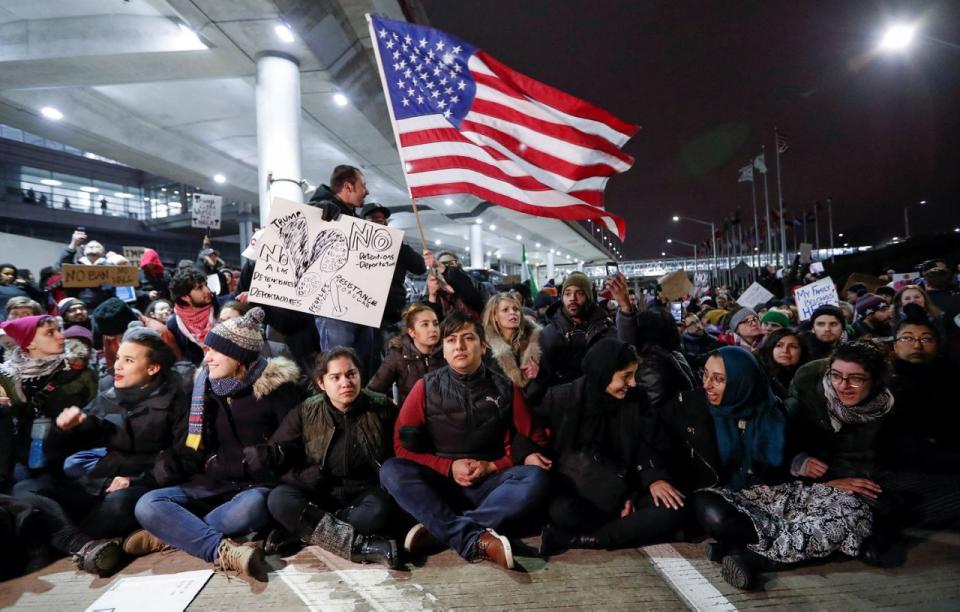 Protesters against a travel ban, at O'Hare airport in Chicago