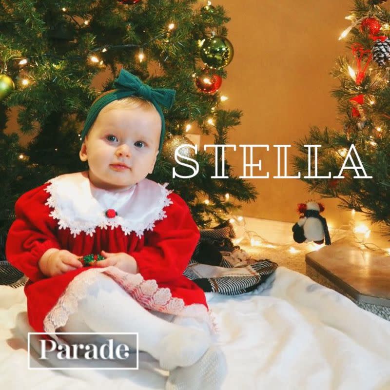 Little girl in a Christmas outfit, in front of a Christmas tree. <p>Shaylyn Yn/Unsplash</p>