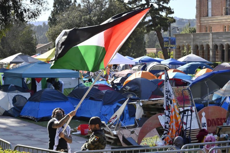 A pro-Palestinian encampment is seen cordoned off by stanchions on the UCLA campus on Sunday Mary Osako, vice chancellor of UCLA Strategic Communications, issued a statement Sunday saying, "UCLA has a long history of being a place of peaceful protest, and we are heartbroken to report that today, some physical altercations broke out among demonstrators on Royce Quad," adding how UCLA had "instituted additional security measures and increased the numbers of our safety team members on site." Photo by Jim Ruymen/UPI