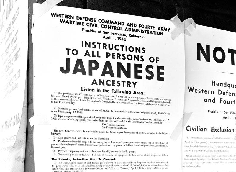 San Francisco, California. Exclusion Order posted at First and Front Streets directing removal of persons of Japanese ancestry from the first San Francisco section to be effected by the evacuation 4/11/1942.