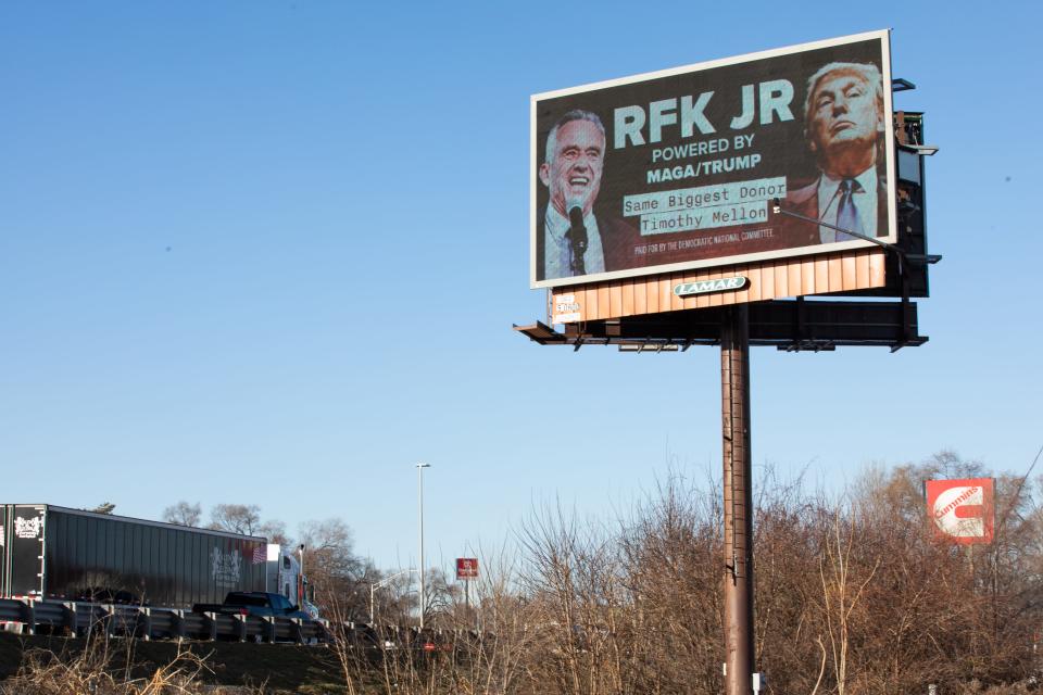 As Robert F. Kennedy Jr. campaigns in Grand Rapids, billboard launched by the Democratic National Committee highlights how Robert F. Kennedy's Super PAC is allegedly receiving millions from Donald Trump's largest donor, Timothy Mellon on February 9, 2024 in Grand Rapids, Michigan.