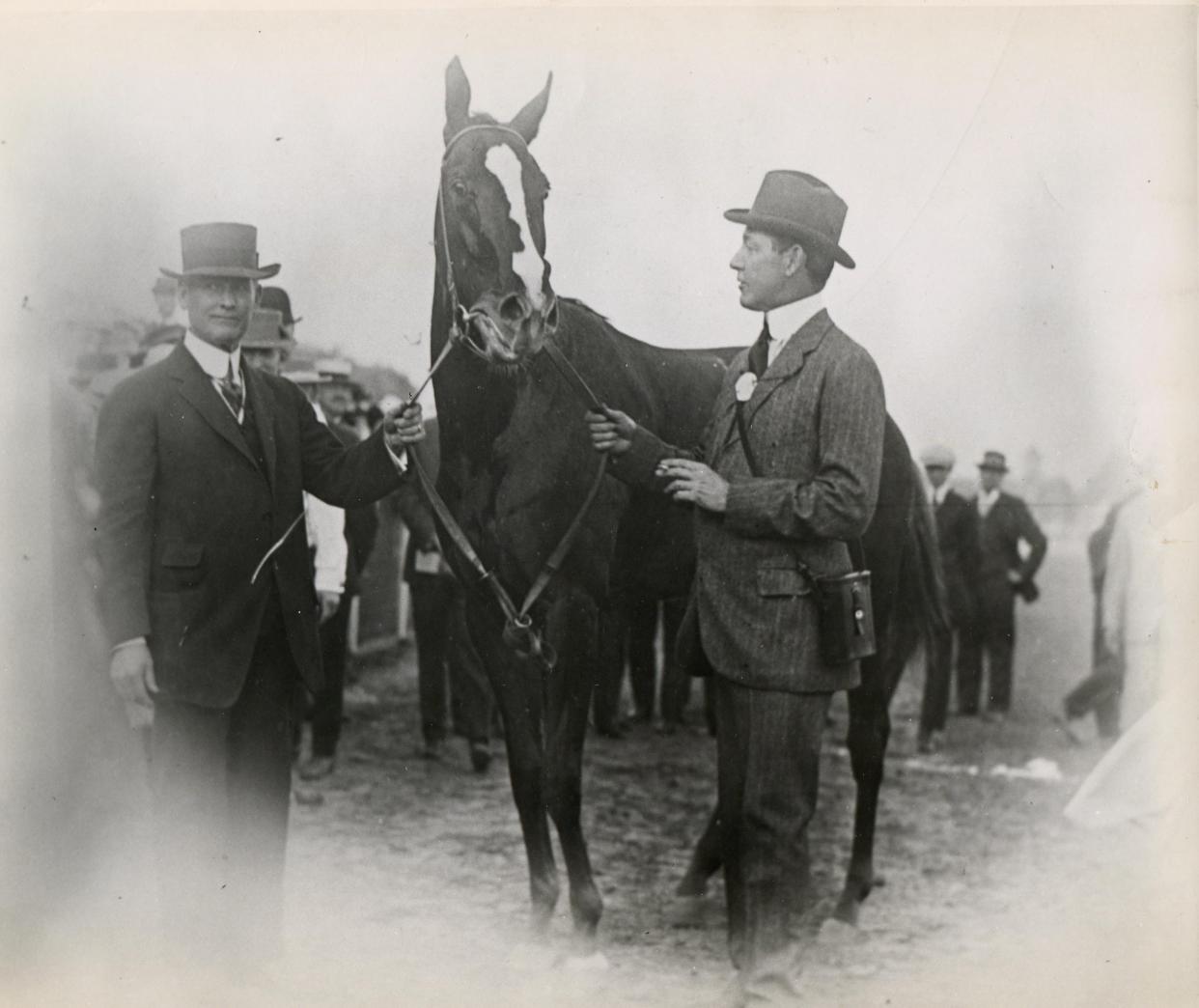 Trainer James Rowe (left), Regret and owner H.P. Whitney enjoyed the Kentucky Derby win in 1915. Regret became the first filly to win the Run for the Roses.