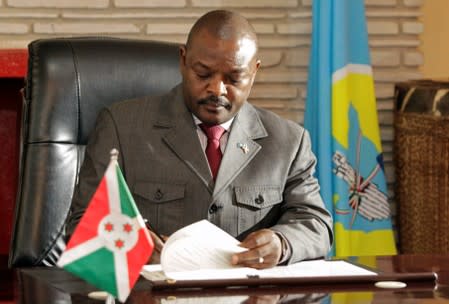 FILE PHOTO: Burundi's President Pierre Nkurunziza signs the new constitution at the presidential palace in Gitega Province