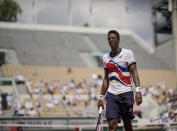 Gael Monfils of France grimaces as he looks towards the umpire as he plays against Sweden's Mikael Ymer during their second round match on day 5, of the French Open tennis tournament at Roland Garros in Paris, France, Thursday, June 3, 2021. (AP Photo/Christophe Ena)