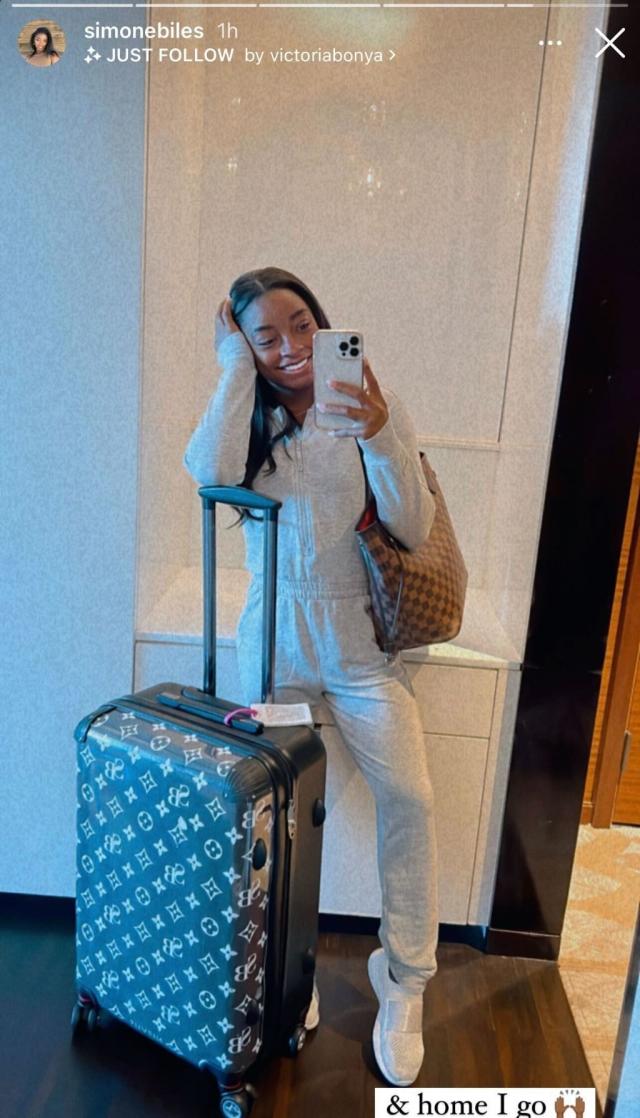 Simone Biles Takes Flight in Sporty Jumpsuit, Sleek Sneakers and Louis  Vuitton Luggage
