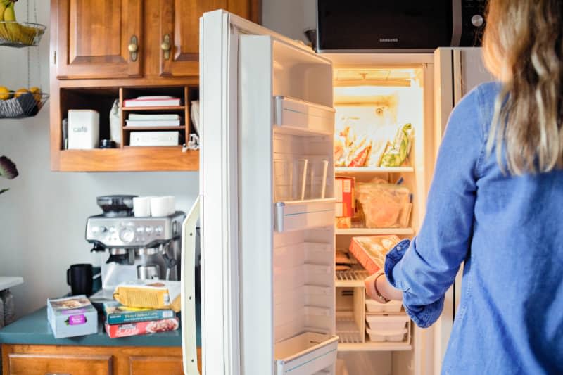 Putting food in the freezer, in an organized fashion