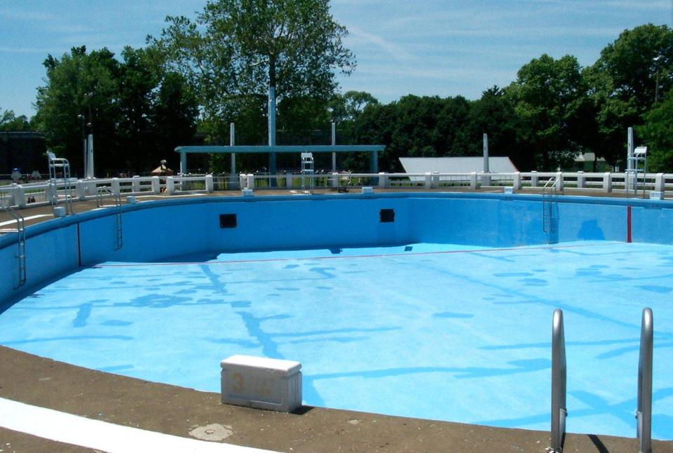 The oval-shaped pool at Brand Park Pool, as it appeared when this photo was taken in July 2001. It is about 50 yards long and 30 yards wide.