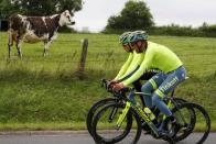 Cycling - Tour de France cycling race - Training ahead of the weekend's start - Coutances, France - 1/07/2016 - Tinkoff team rider Alberto Contador of Spain (L) and team mate during a training session - REUTERS/Juan Medina