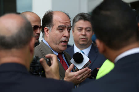 Julio Borges, lawmaker of the Venezuelan coalition of opposition parties (MUD), and members of Venezuela's opposition talk to the media after a meeting in Santo Domingo, Dominican Republic February 7, 2018. REUTERS/Ricardo Rojas