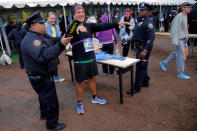 Athletics - New York City Marathon - New York, U.S. - November 5, 2017 - New York Police conduct security checks as runners check in for the New York City Marathon. REUTERS/Andrew Kelly