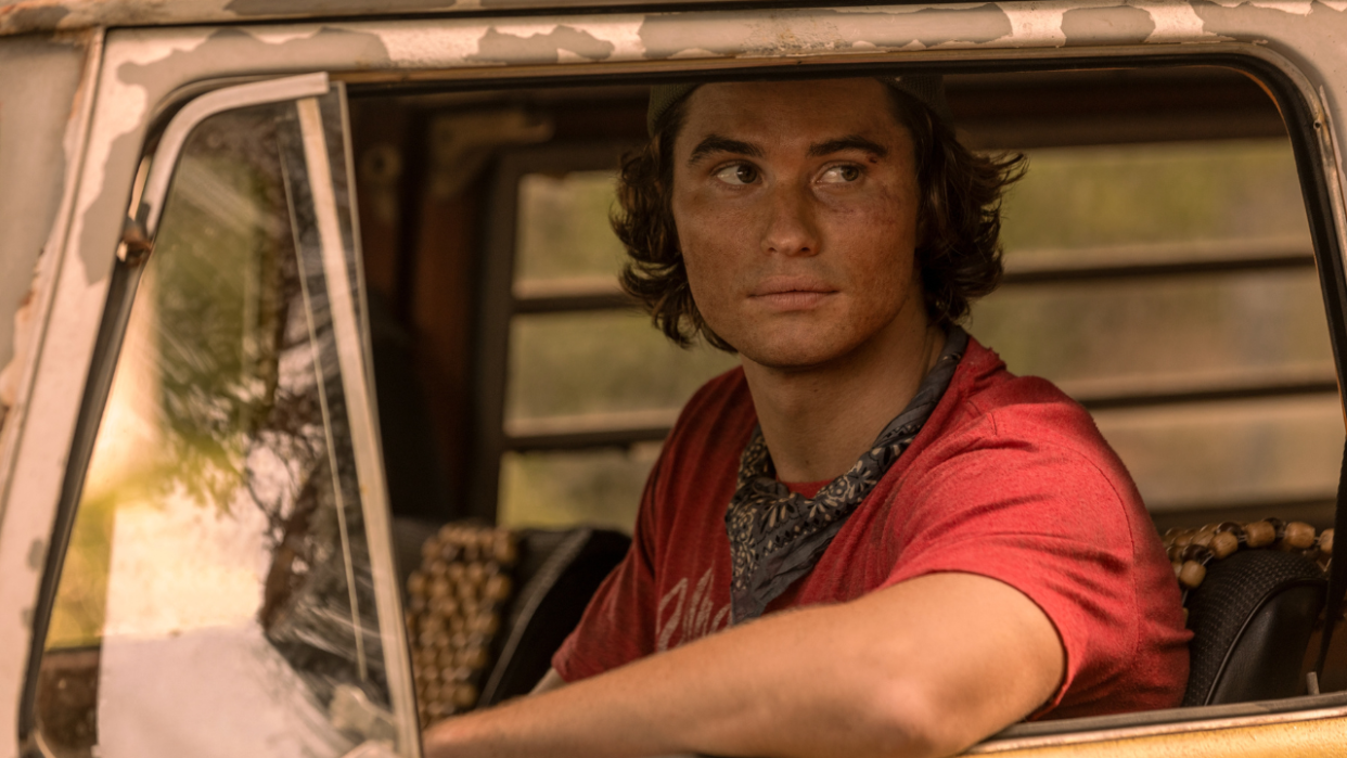  Chase Stokes as John B. looking out a van's window on Outer Banks. 