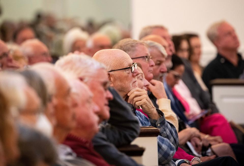 Audience members listen as panelists answer questions at the Community Forum on Civility in Collier County on Wednesday, Feb. 7, 2024, at the Naples United Church of Christ in Naples.