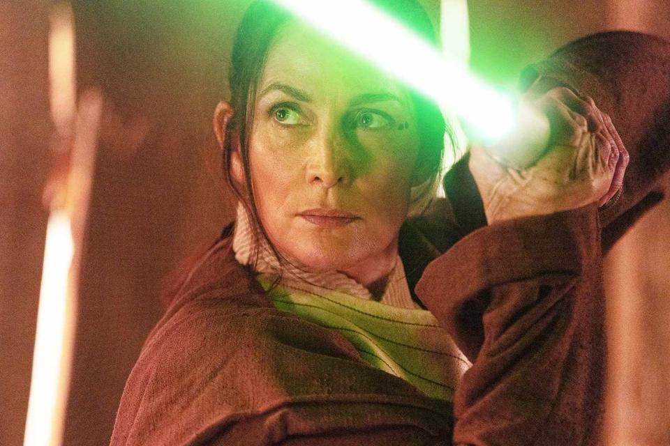 <p>Disney+/Lucasfilm</p> Carrie-Anne Moss in 