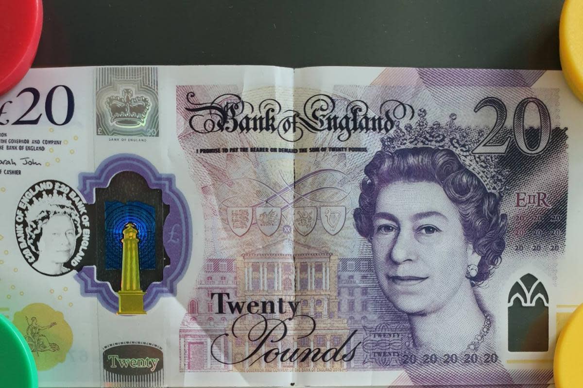 Fake money circulated * The top one is the fake. Note the clear panel, with the portrait of the queen. <i>(Image: Weymouth and Portland Police)</i>