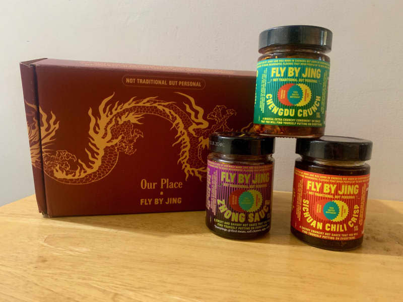 Fly by Jin sauces and Our Place cookware in a box.