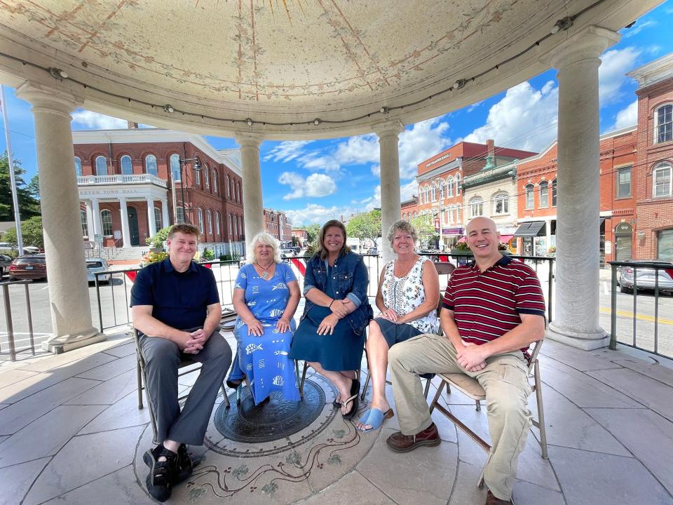 The bandstand in the center of the town of Exeter is used for many activities and events of the historic and present-day Seacoast town. From left are Water Street Bookstore owner Dan Chartrand, Exeter Chamber of Commerce Bobbi Vandenbulcke, Jennifer Wheeler and Renee Weiland and Darren Winham, economic development director.