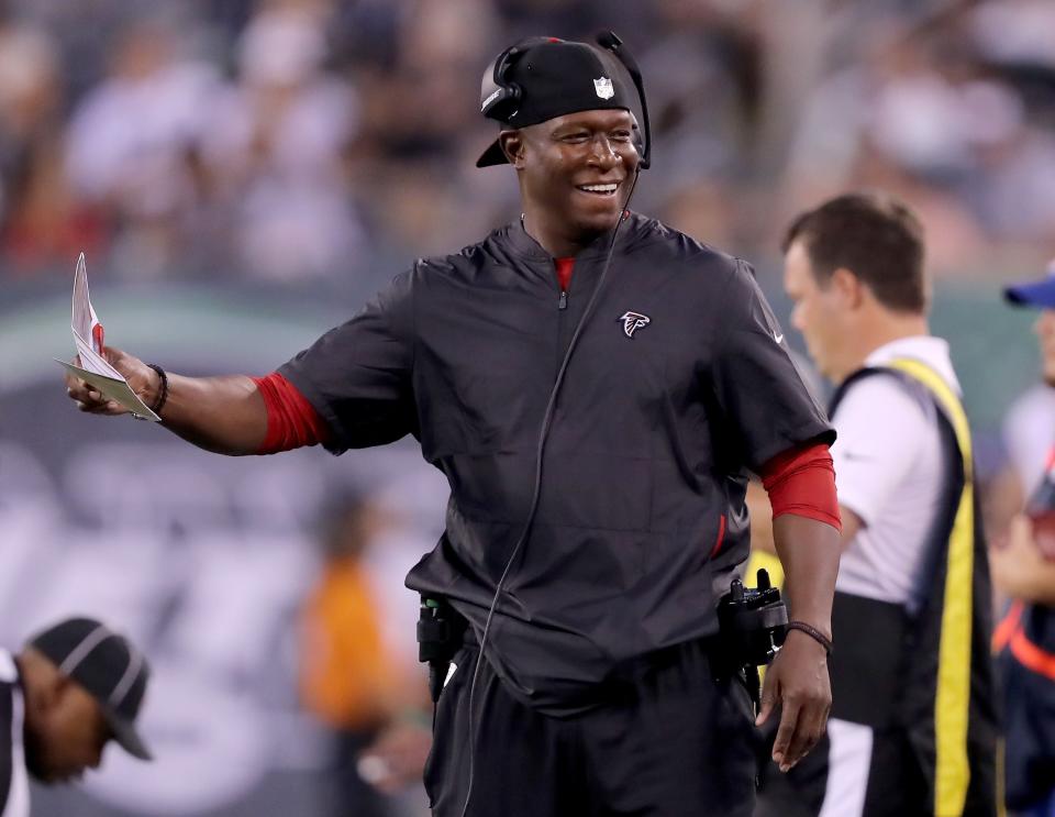 EAST RUTHERFORD, NJ - AUGUST 10: Assistant coach Raheem Mooris of the Atlanta Falcons reacts in the first half against the New York Jets during a preseason game at MetLife Stadium on August 10, 2018 in East Rutherford, New Jersey.  (Photo by Elsa/Getty Images)