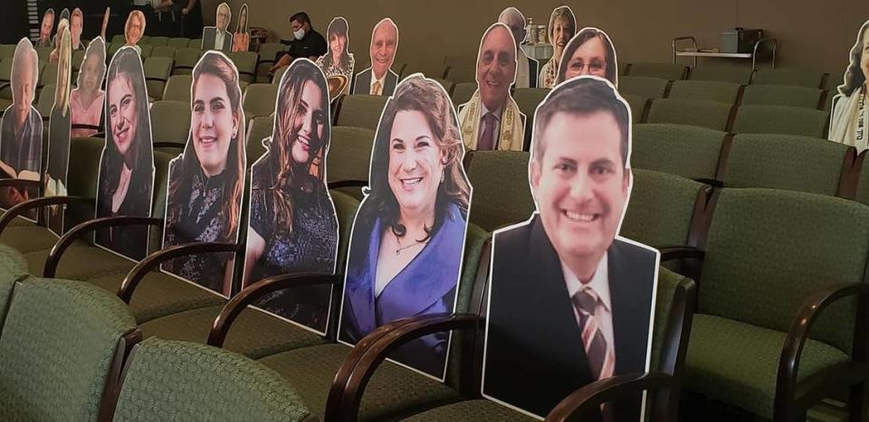 Temple Judea will place cardboard cutouts of congregants on the seats in the sanctuary ahead of High Holy Day services.