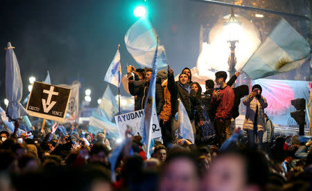 Anti-abortion rights activists celebrate lawmakers voted against a bill legalizing abortion, in Buenos Aires, Argentina August 9, 2018. REUTERS/Agustin Marcarian