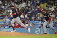 Washington Nationals' Jesse Winker rounds first base after hitting a two-run home run against the Los Angeles Dodgers during the third inning of a baseball game Tuesday, April 16, 2024, in Los Angeles. (AP Photo/Marcio Jose Sanchez)