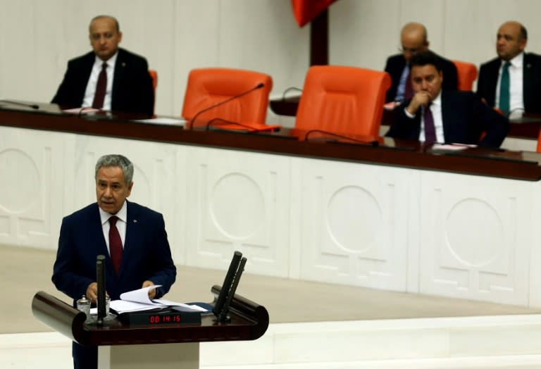 Turkish Minister Deputy Prime Minister Bulent Arinc speaks during an extraordinary meeting on July 29, 2015 in Ankara