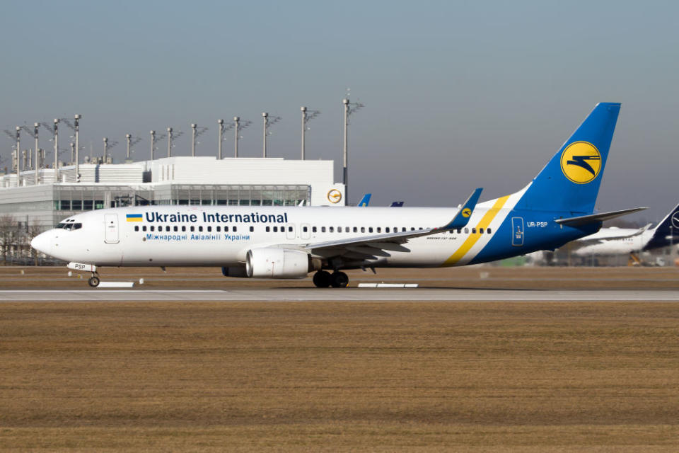 Pictured is a Ukraine International Airlines jet on a tarmac in Munich, Germany. 