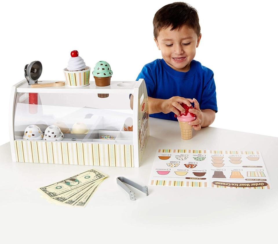 If your kiddo <i>loves</i> ice cream, you might get them <a href="https://amzn.to/3hRan4Y" target="_blank" rel="noopener noreferrer">their very own play parlor</a>. This ice cream station includes things like a scooper, scoops, cones and fake money. They'll definitely be entertained. <a href="https://amzn.to/3hRan4Y" target="_blank" rel="noopener noreferrer">Find it for $43 at Amazon</a>.