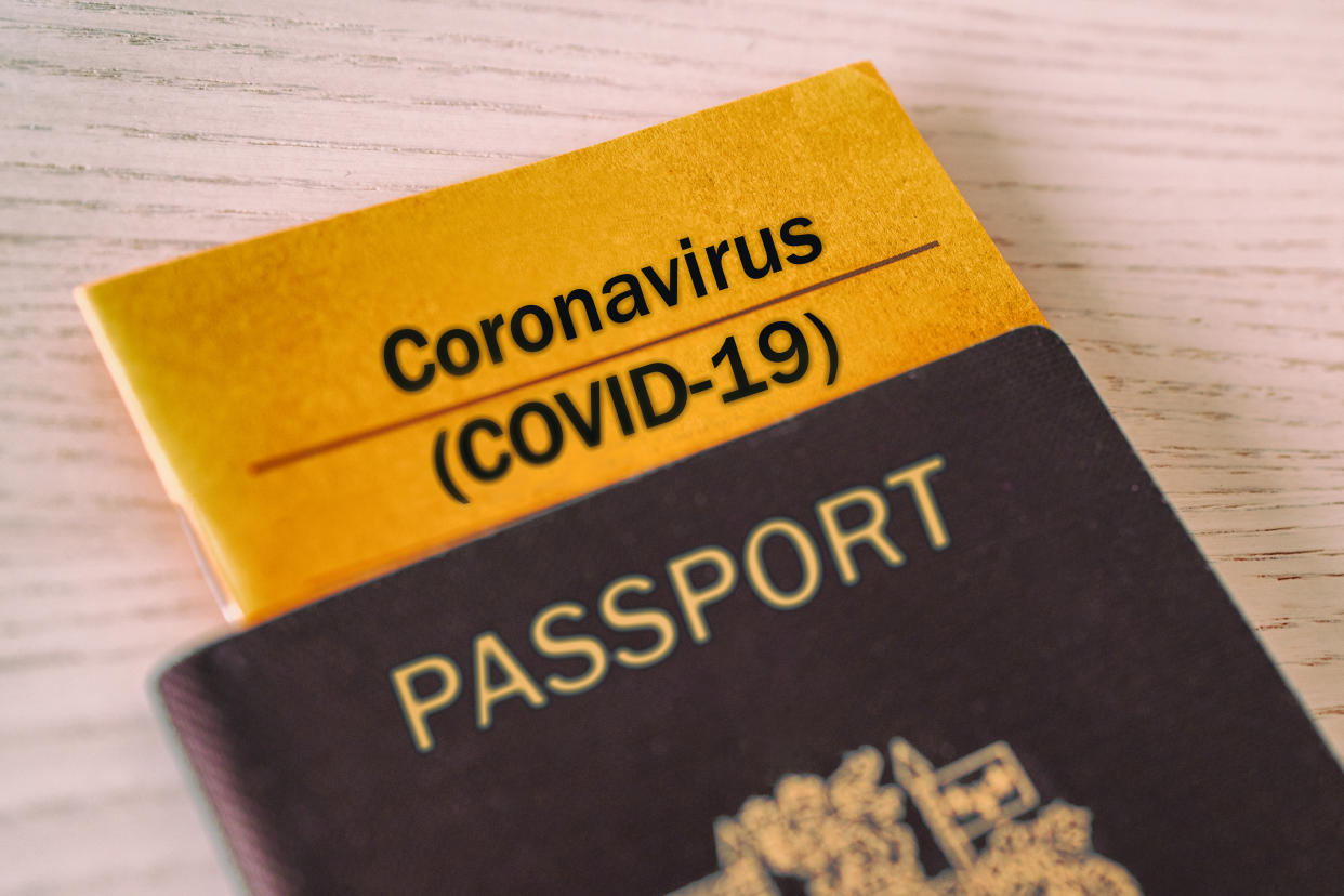 Coronavirus COVID-19 Vaccination proof booklet in passport. Travel ban health certificate Corona screening of travelers tourists. Closure of airports restricted traveling.