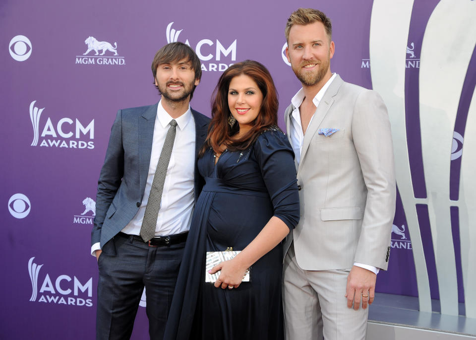 From left, Dave Haywood, Hillary Scott and Charles Kelley, of musical group Lady Antebellum, arrive at the 48th Annual Academy of Country Music Awards at the MGM Grand Garden Arena in Las Vegas on Sunday, April 7, 2013. (Photo by Al Powers/Invision/AP)