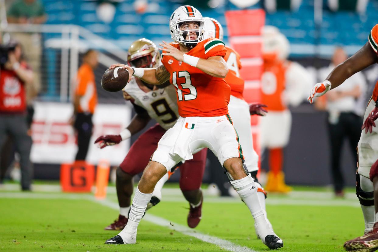 Nov 5, 2022; Miami Gardens, Florida, USA; Miami Hurricanes quarterback Jake Garcia (13) throws the football during the second quarter against the Florida State Seminoles at Hard Rock Stadium. Mandatory Credit: Sam Navarro-USA TODAY Sports