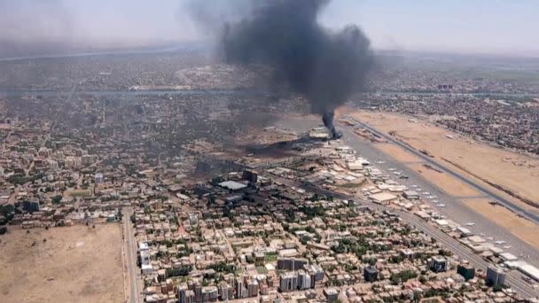 PHOTO: This image grab taken from AFPTV video footage on April 20, 2023, shows an aerial view of black smoke rising above the Khartoum International Airport amid ongoing battles between the forces of two rival generals. (AFP via Getty Images)