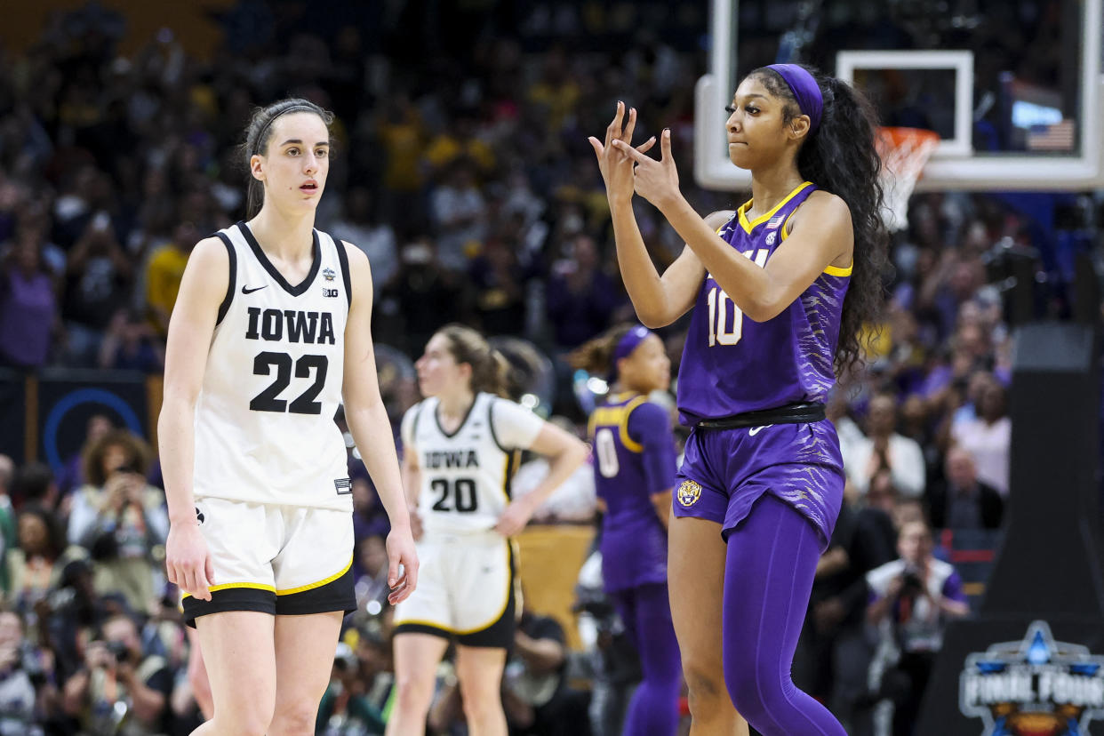 LSU forward Angel Reese gestures toward her ring finger in the direction of Iowa guard Caitlin Clark in the closing minutes of the women&#39;s NCAA tournament national championship game at the American Airlines Center in Dallas on April 2, 2023. (Kevin Jairaj/USA TODAY Sports)