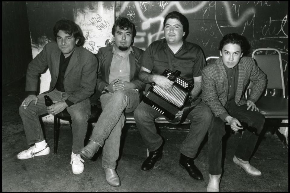 A black-and-white photo of Los Lobos members Conrad Lozano, left, Cesar Rosas, David Hidalgo and Louis Pérez in 1982.