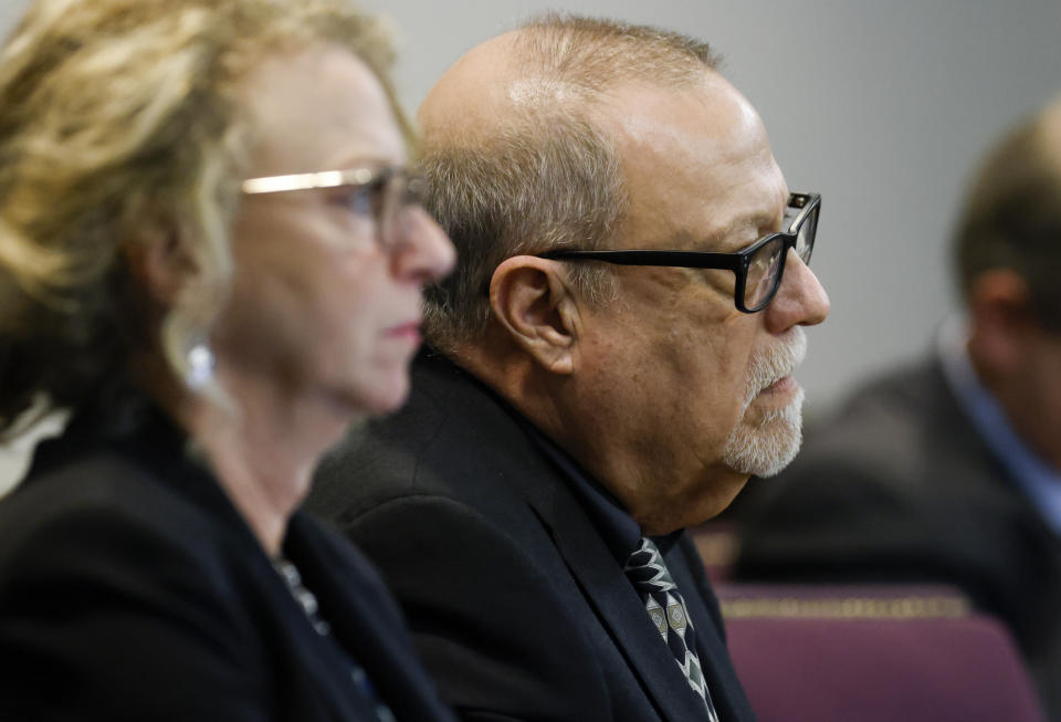 Gregory McMichael sits next to defense attorney Laura Hogue as they attend the jury selection in his trial together with Travis McMichael and their neighbor, William "Roddie" Bryan, charged with the February 2020 death of 25-year-old Ahmaud Arbery at the Gwynn County Superior Court in Brunswick, Ga., Wednesday, Oct. 27, 2021. (Octavio Jones/Pool Photo via AP)