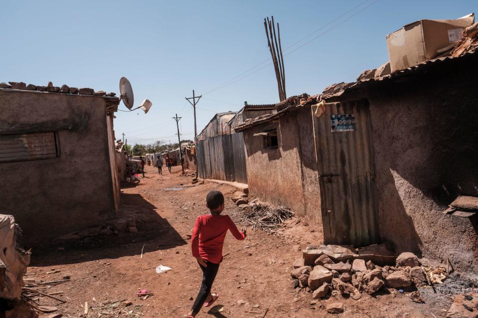 An Eritrean refugee child runs in an alley at Mai Aini Refugee camp, in Ethiopia, on January 30, 2021. / Credit: EDUARDO SOTERAS/AFP via Getty Images