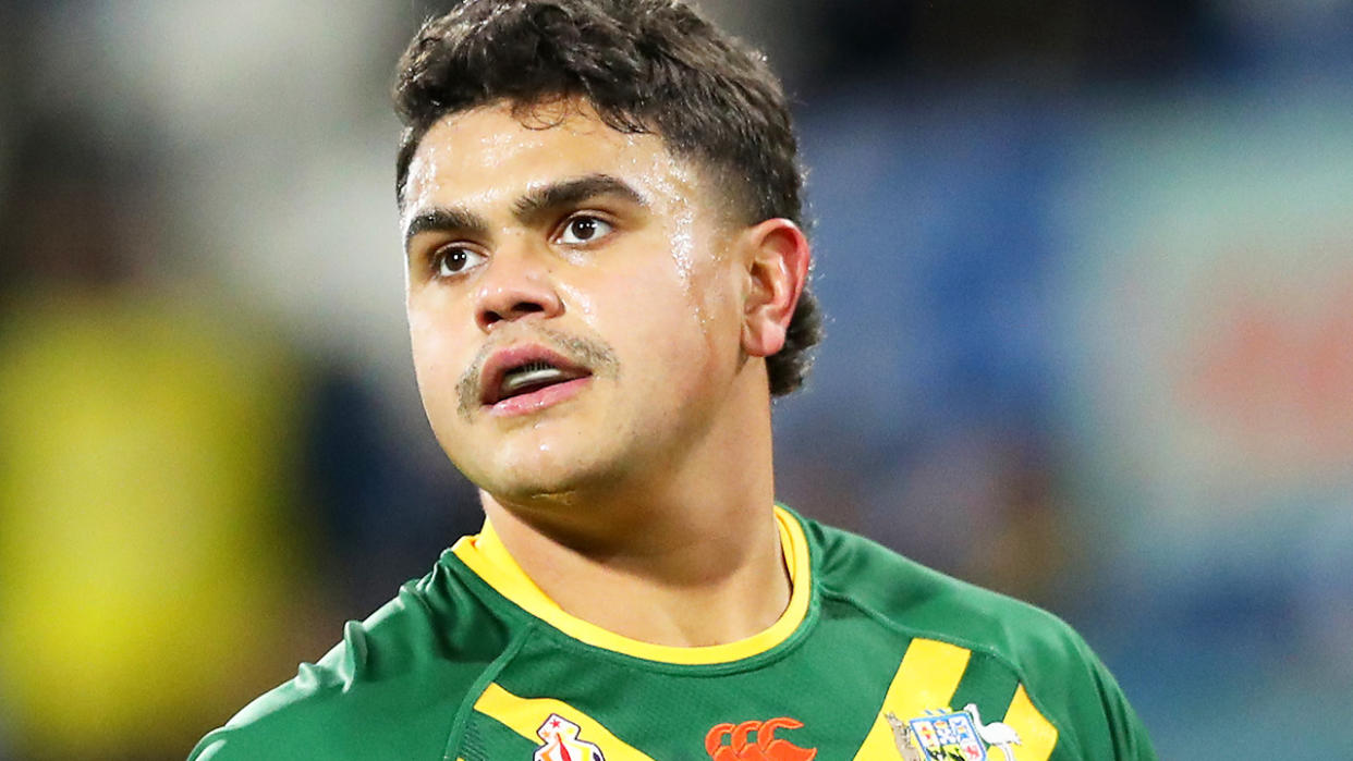 Latrell Mitchell is pictured looking on during a match for the Kangaroos at the Rugby League World Cup.