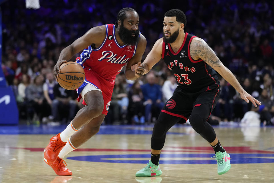 Philadelphia 76ers' James Harden (1) tries to get past Toronto Raptors' Fred VanVleet (23) during the second half of an NBA basketball game, Friday, March 31, 2023, in Philadelphia. (AP Photo/Matt Rourke)