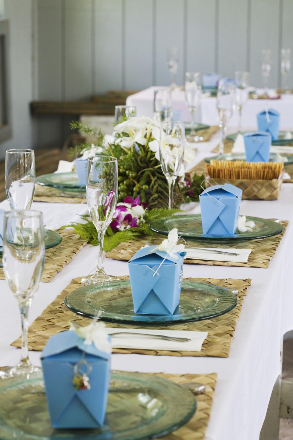 wedding favor boxes set at the dinner tables