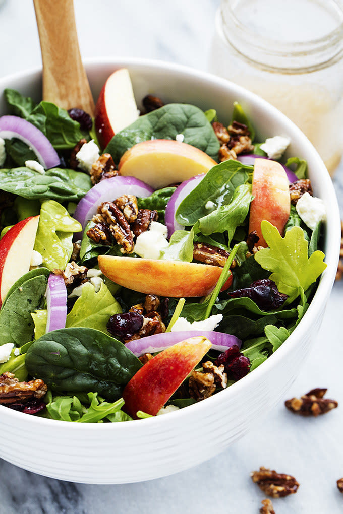 An easy fall salad with sweet red apples, crunchy candied pecans, feta cheese, and a quick maple vinaigrette dressing you will love! Recipe: Apple Pecan Salad with a Maple Vinaigrette 