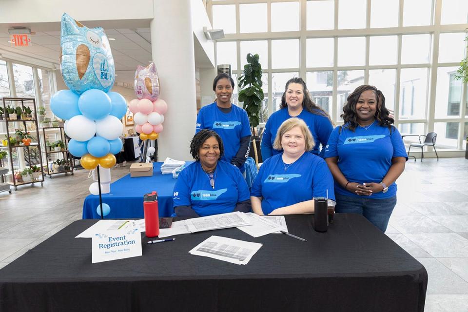 A key to BlueCare Tennessee’s success is meeting its members where they are in their communities. Pictured are BlueCare employees on site and ready to assist attendees at a “healthy moms and babies” maternity event.