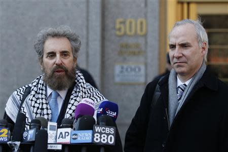 Stanley Cohen (L), and Geoffrey S. Stewart, the defense lawyers for Osama Bin Laden's son-in-law, Sulaiman Abu Ghaith, speak to the media outside Manhattan Federal Court in New York, March 26, 2014, following a three-week trial that offered an unusually intimate portrait of al Qaeda's former leader in the days after the September 11, 2001 attacks. REUTERS/Eduardo Munoz