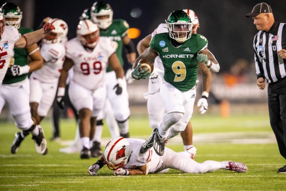 Sacramento State Hornets running back Marcus Fulcher (9) runs in for a touchdown against University of the Incarnate Word (Texas) during the first quarter of the NCAA college football FCS playoffs quarterfinal game Friday, Dec. 9, 2022, at Hornet Stadium in Sacramento.