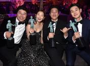 The <em>Parasite </em>cast members (Kang-Ho Song, Park So-dam, Lee Sun Gyun, and Choi Woo-shik) finally get to sit down after that two-minute standing ovation - oh yeah, <a href="https://people.com/movies/sag-awards-2020-parasite-wins-cast-motion-picture/" rel="nofollow noopener" target="_blank" data-ylk="slk:and big win for outstanding performance by a cast in a motion picture;elm:context_link;itc:0;sec:content-canvas" class="link ">and big win for outstanding performance by a cast in a motion picture</a>.