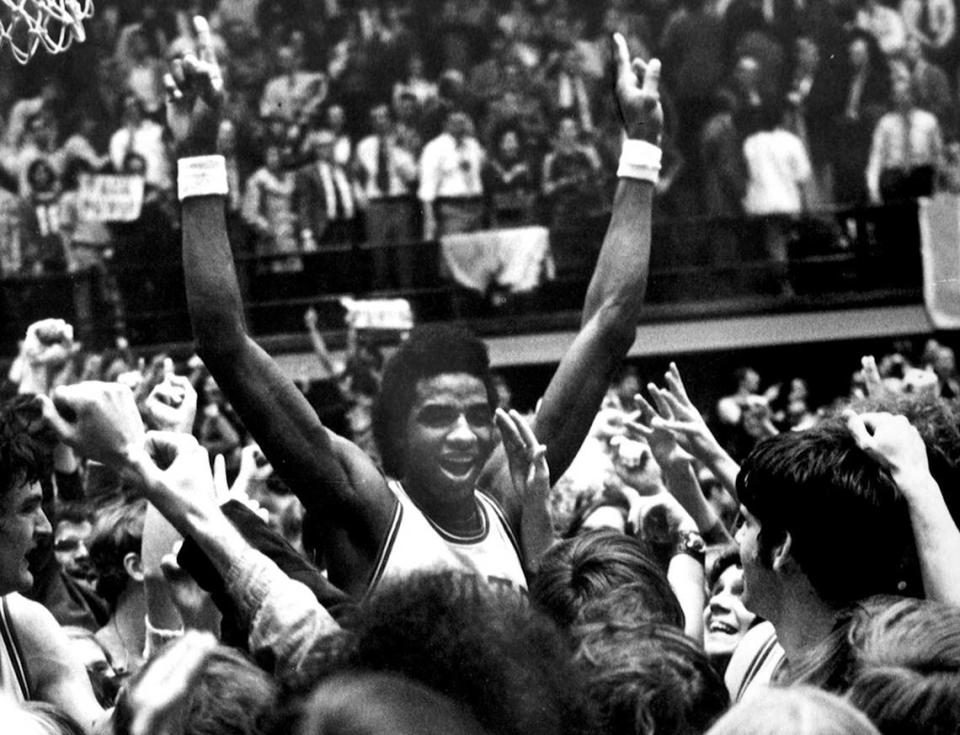 David Thompson, N.C.State basketball star, is hoisted by admiring fans after the Wolfpack beat Maryland, 89-78, in Reynolds Coliseum in 1973. Thompson had 24 points and 11 rebounds as State won its 15th consecutive victory of the 1972-73 season.