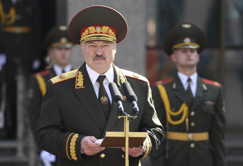 Belarusian President Alexander Lukashenko delivers a speech during his inauguration ceremony at the Palace of the Independence in Minsk, Belarus, Wednesday, Sept. 23, 2020. Lukashenko of Belarus has assumed his sixth term of office in an inauguration ceremony that wasn't announced in advance. State news agency BelTA reported that Wednesday's ceremony is taking place in the capital of Minsk, with several hundred top government official present. (Maxim Guchek, BelTA/Pool Photo via AP)