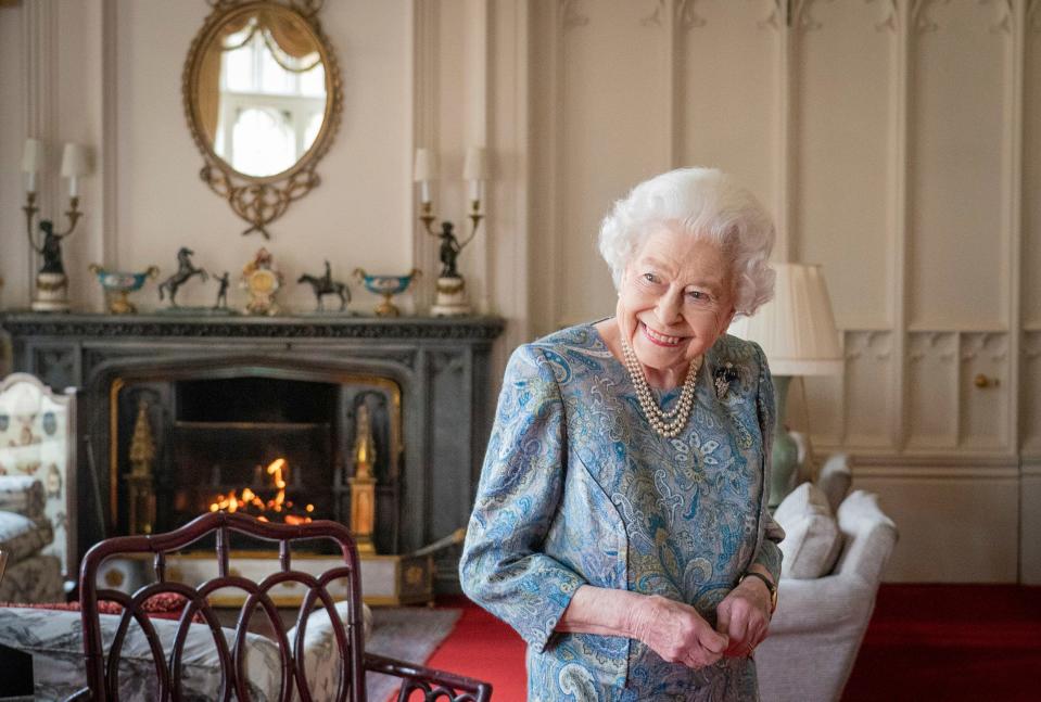 Britain's Queen Elizabeth II smiles while receiving the President of Switzerland Ignazio Cassis and his wife, Paola Cassis, during an audience at Windsor Castle in Windsor, England, in April.