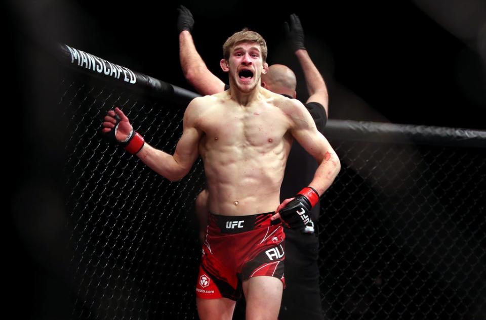 Arnold Allen celebrates the biggest victory of his career, against Dan Hooker (PA)