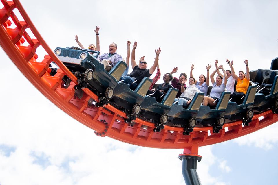 People ride Big Bear Mountain during the roller coaster's grand opening in Dollywood's Wildwood Grove on Friday, May 12, 2023.