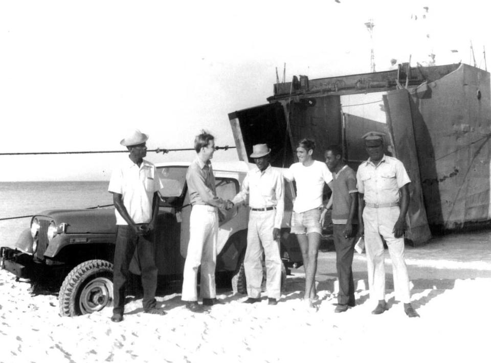 Grey Pierson, second from left, visits Haiti’s Île de la Tortue or Tortuga Island in 1972, a year after his father’s 99-year-lease with the Haitian government to develop the barrier island was published in the government’s official newspaper.