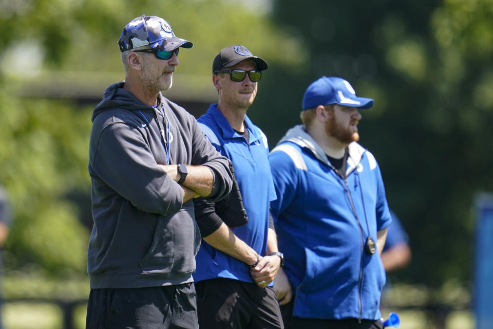 Indianapolis Colts head coach Frank Reich watch drills during practice at the NFL team's football training camp in Westfield, Ind., Thursday, July 28, 2022. (AP Photo/Michael Conroy)